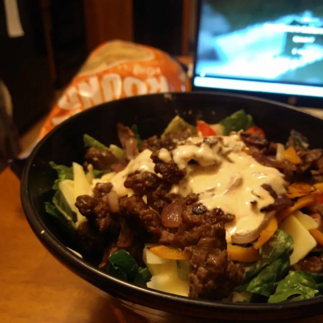 Taco salad! Just as much work as a fully cooked meal. 

Picture 2) So first I washed and spun the lettuce and pulled some ingredients together

Picture 3) the salad dressing was about a Tablespoon of mayonnaise, half a cup of plain yogurt, and then I went in with the salsa but it wasn't giving me either the texture or intensity of flavor that I wanted - so I switched to three packets of Taco Bell's fire sauce. I don't often eat from Taco Bell, but I have to every now and then because I haven't found a better set of for sauces than their sauce packets for giving my lunches a variety of easy flavor boats that are each a bit different. Anyway - I also added some Penzey's southwest seasoning, and that was it. 

Also in picture three you are that I've got some (1/4 lb) ground beef going in a skillet with sliced onions and orange bell pepper. The ground beef was marinated in Southwest seasoning, corn starch, a little baking soda, soy sauce, shaoxing wine, and some water.

Picture 4) I added some dressing to the lettuce and then added a sliced jalapeño and two sliced tomatoes #frommygarden . Also some sliced cucumber and cheddar cheese. Then I added most of the rest of the dressing and stirred everything together. 

Picture 1) when I added the hot toppings (beef, onions, and peppers), the cheese got a little soft and the flavors came together. A drizzle more of the dressing, and it's time to eat.